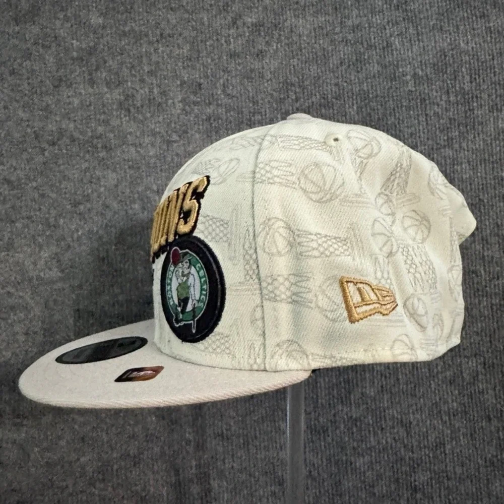 New Era 9FIFTY Boston Celtics NBA Champions 2023-24 Snapback Hat Cream Gold